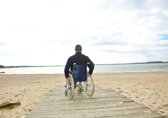 wheelchair man on beach